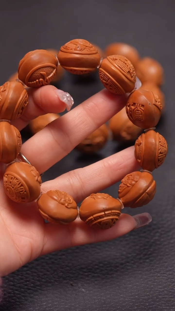 手串橄榄核孤*2..1铁核四象