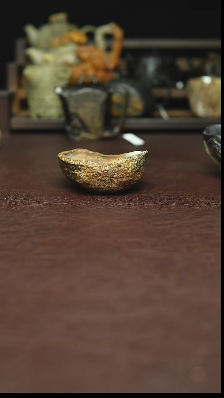 童**人冰碛岩黄豹杯