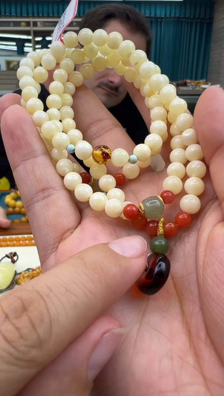 未镶嵌琥珀手链19秒拍号 假一罚三