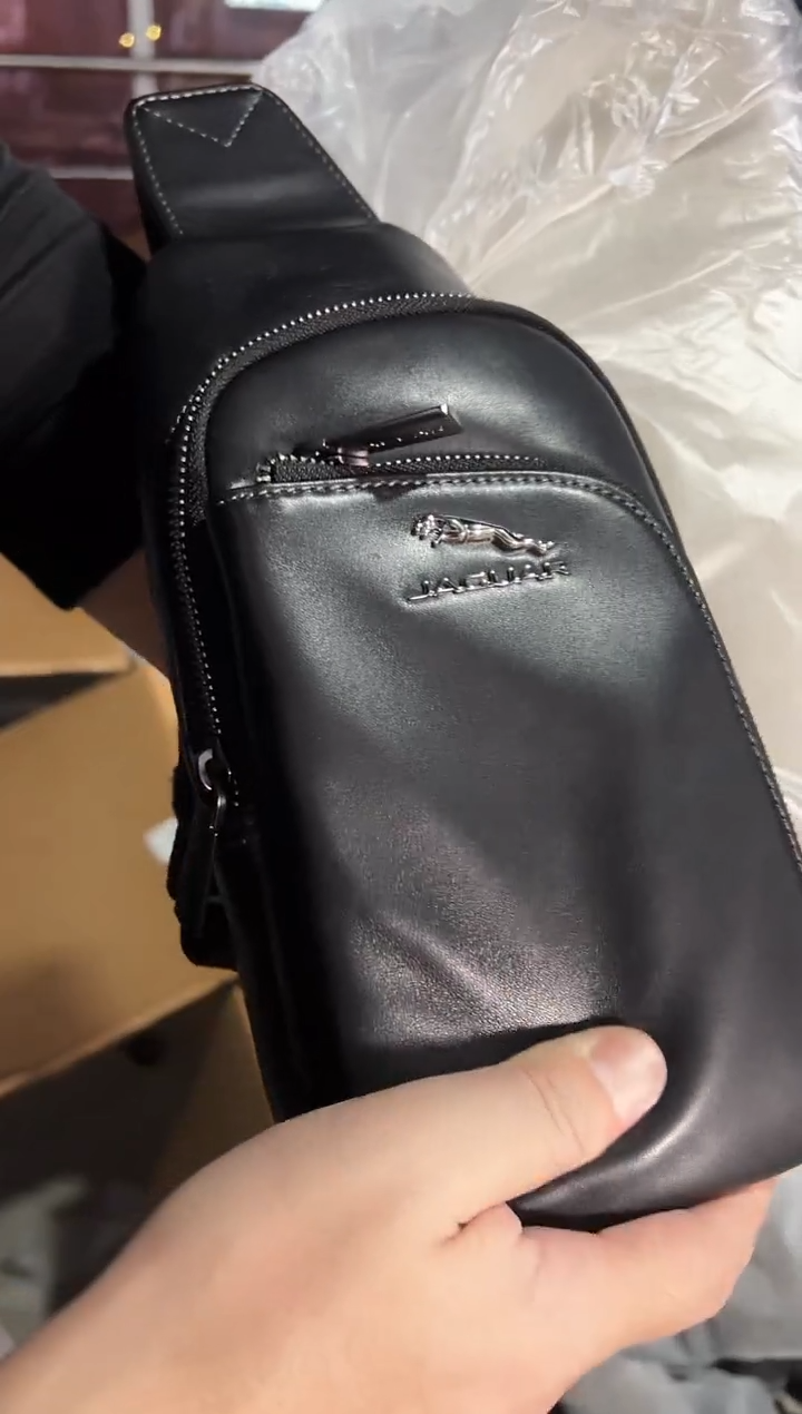 头层牛皮韩爵绅士包包皮具675