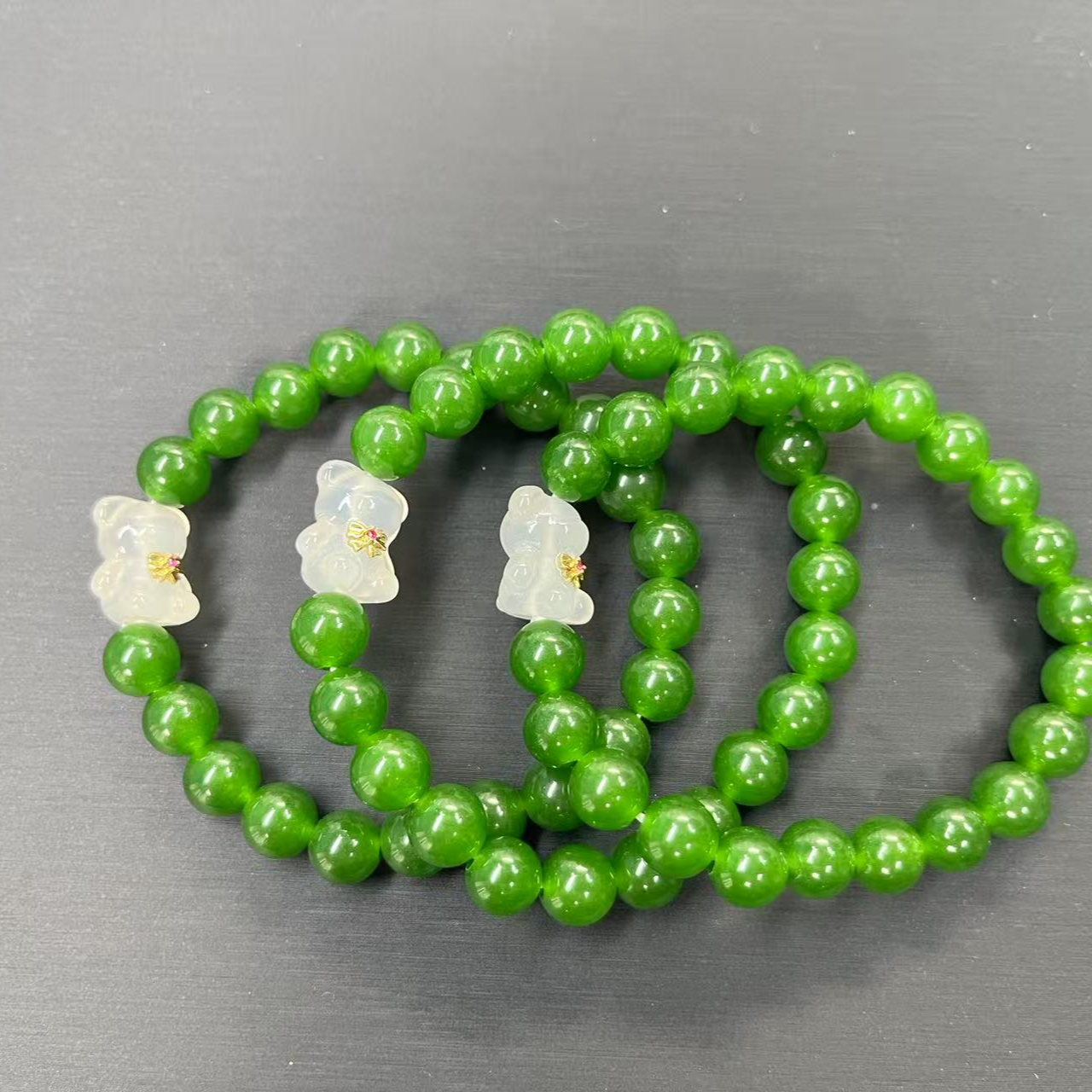 优选时尚设计款菠菜绿卡小熊手串卡戈壁玉多样性拍一发一