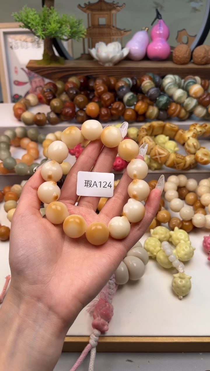 【闪购商品】菩提根/象牙果手串瑕A124猫头16mm一串