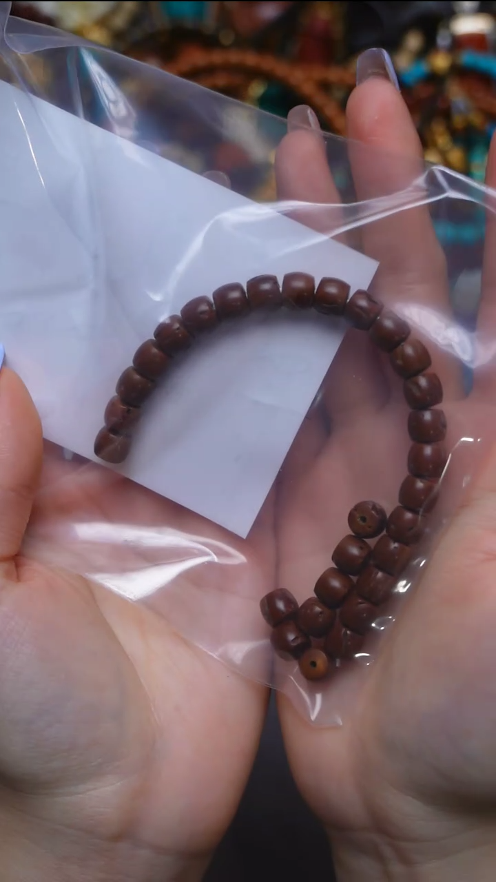 【闪购商品】桃核手串25012603-003