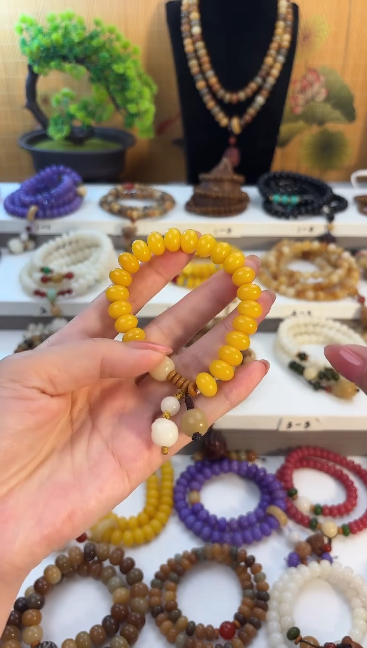 手串菩提根/象牙果8*11帝黄单圈