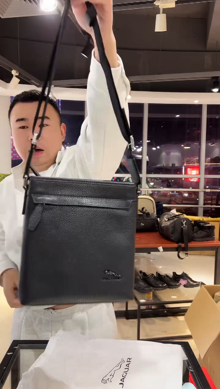 头层牛皮韩爵绅士包包皮具701