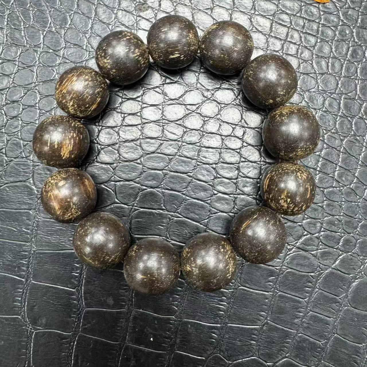 A257海南乌身圆叶文玩手串18mm