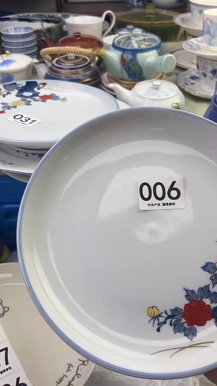 瓷片华****儿1006.......