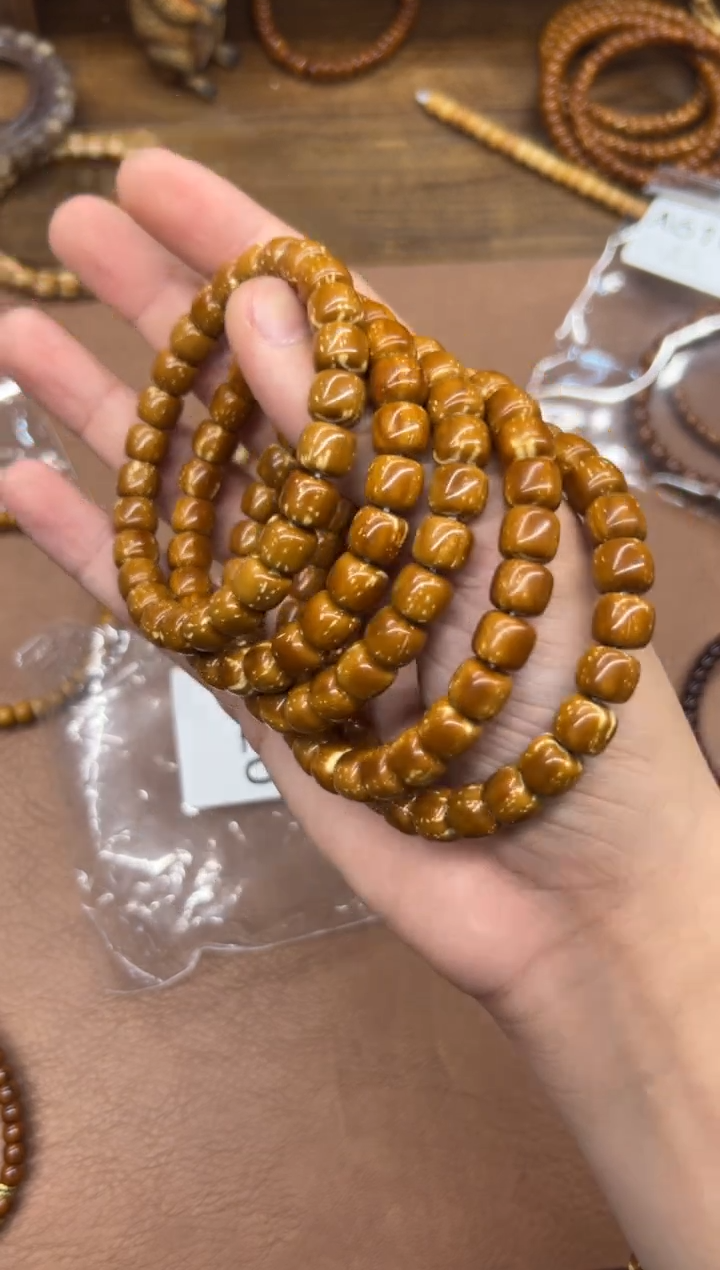 手串紫金鼠A020 8*9黄皮微微花实心