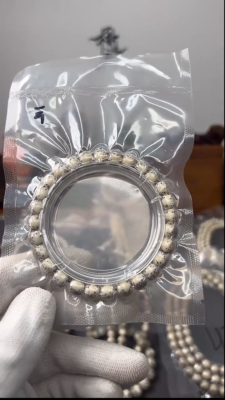 手串星月菩提8*7灰背河豚单圈 海南原生态石玉料同枝果