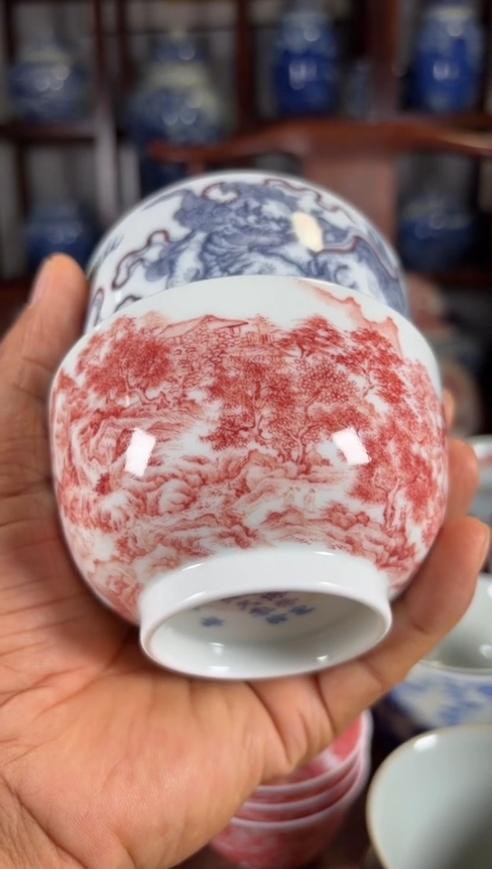 丙**业柴窑釉里红山水和狮子纹杯杯