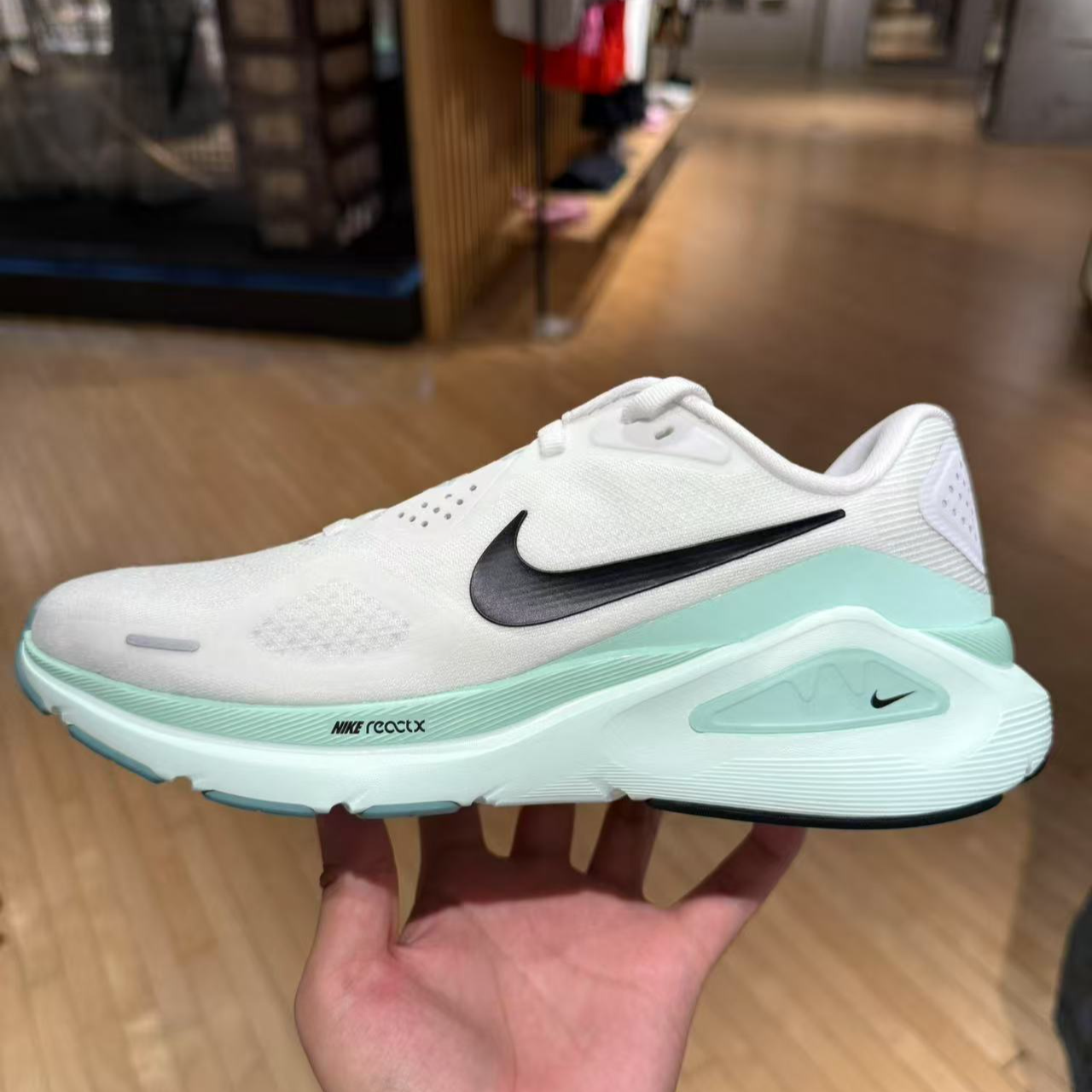 NIKE/耐克STRUCTURE 26 防滑耐磨舒适女款跑步鞋HJ1101-100
