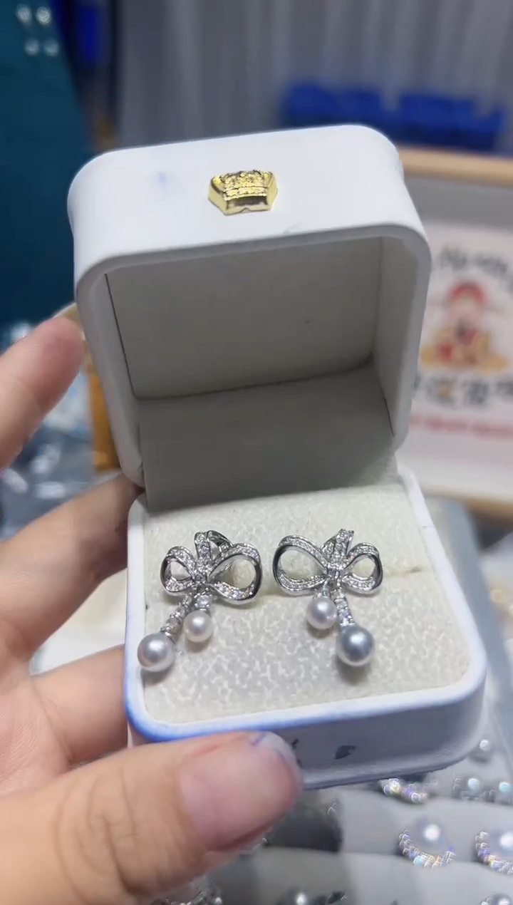 银S925镶嵌耳钉海水珍珠128一颗海水一颗淡水