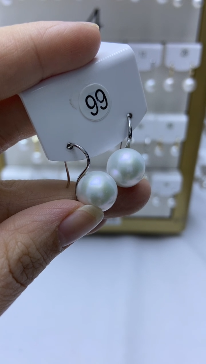 银S925镶嵌耳饰淡水珍珠99