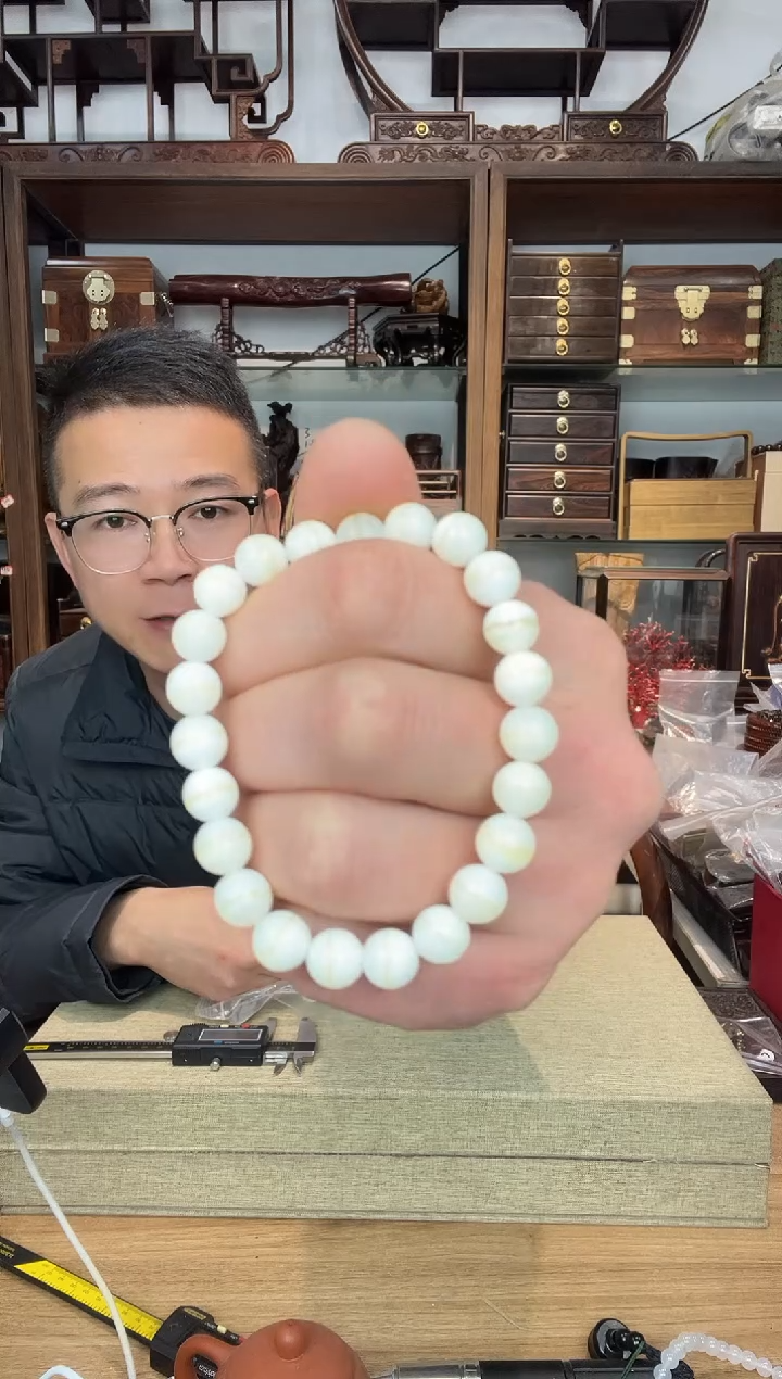 乌木类书架014塑料金丝0.8单圈手串