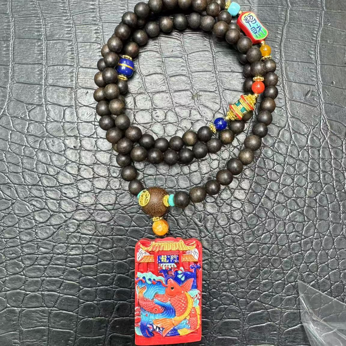 B542海南乌身圆叶文玩吊坠