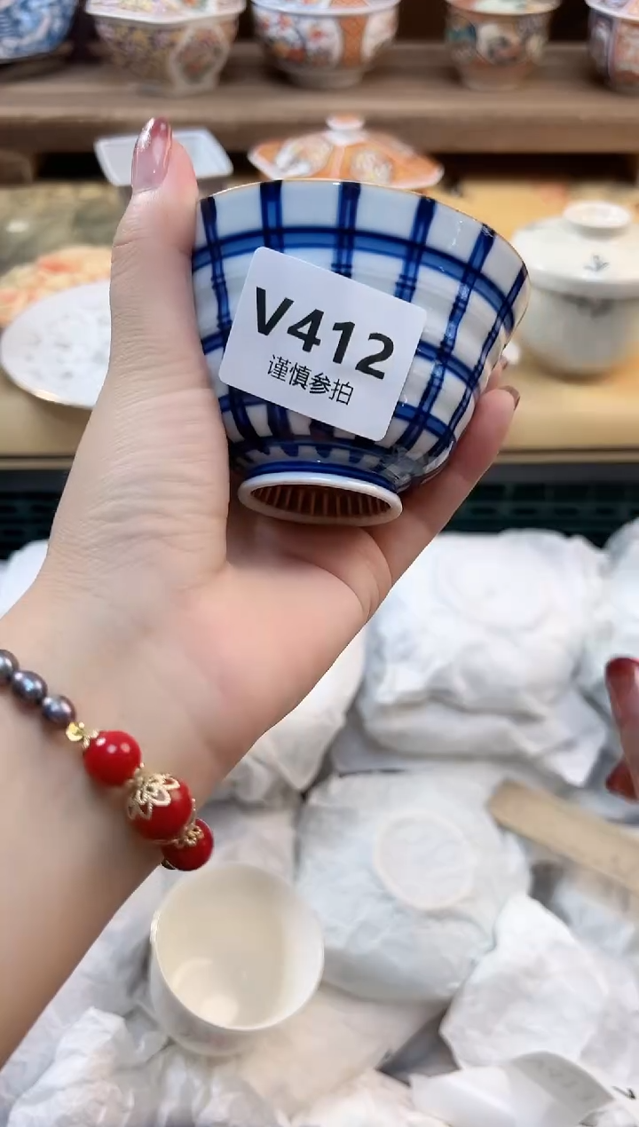 瓷片吴**谓        412