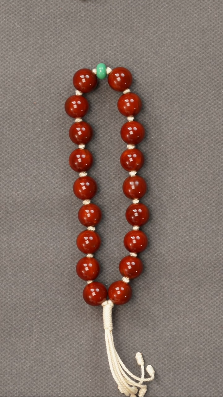 吊坠橄榄核正圆光珠1.2（大孔，微瑕）