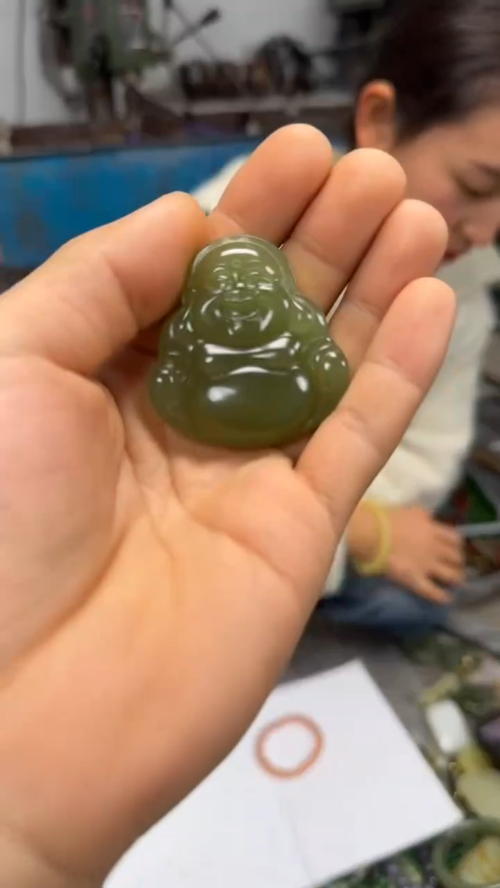 湖水绿色大肚佛公