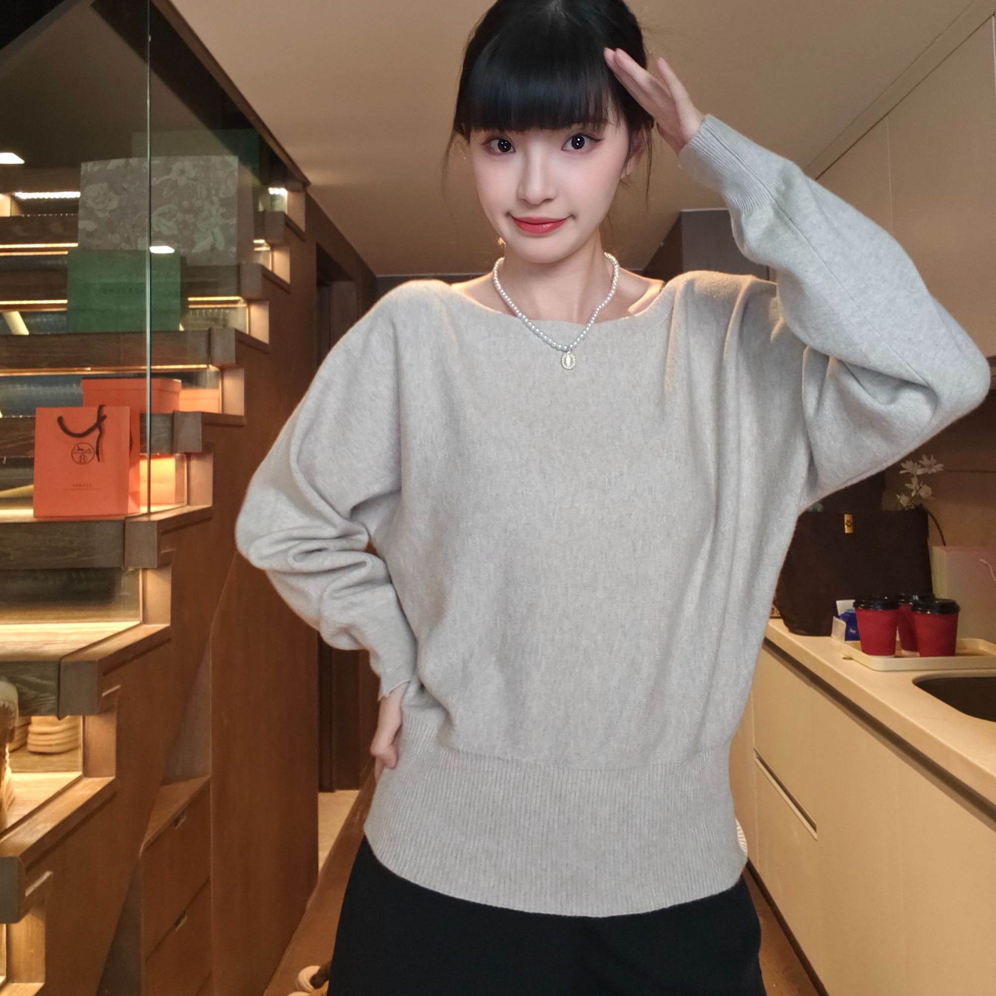 秋季薄款保暖针织一字领毛针织衫性感风圆领落肩袖