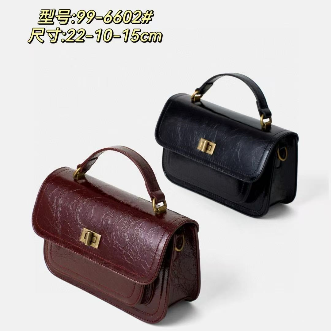 真皮斜挎包女时尚邮差包潮流新款包包女6602