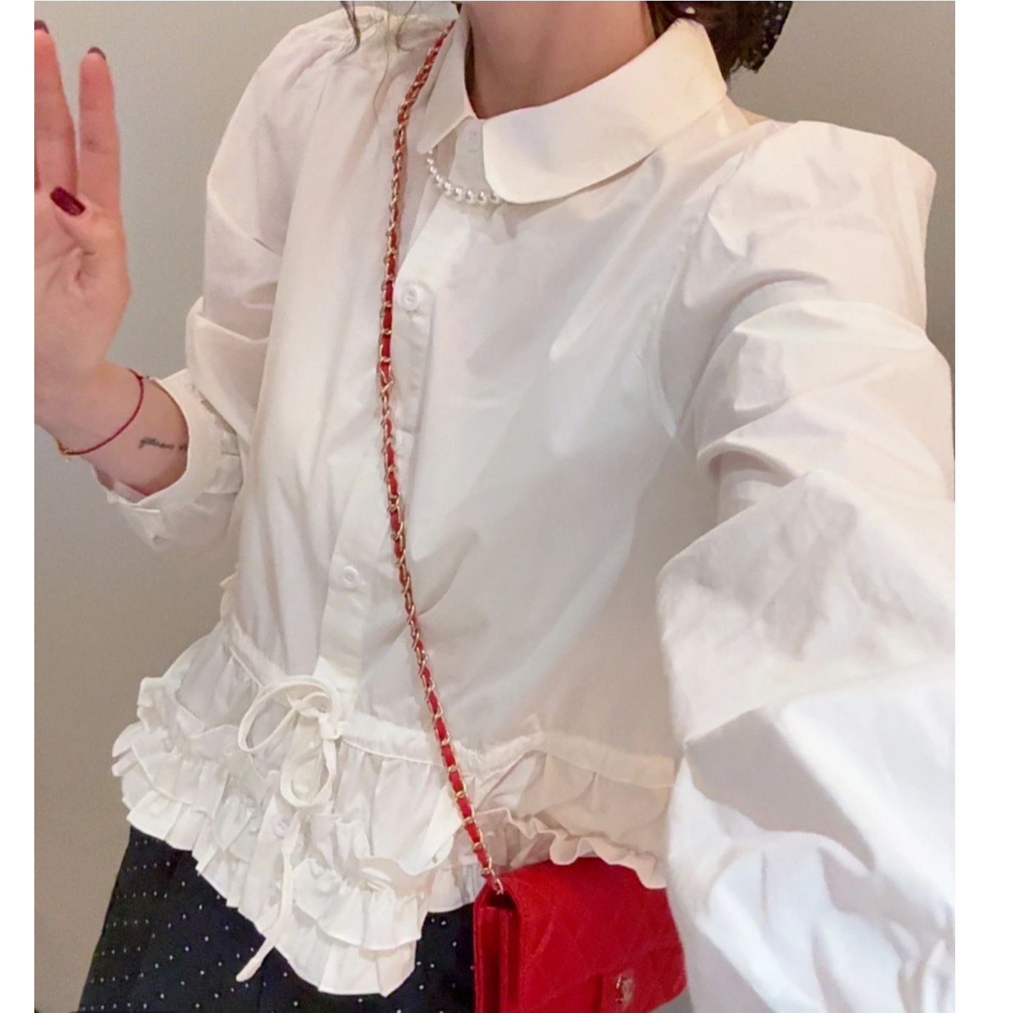 蓬松花瓣下摆衬衫2025新款春季压褶白色花边娃娃领长袖衬衣