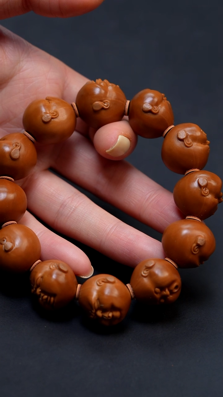 橄榄核手串人生百态