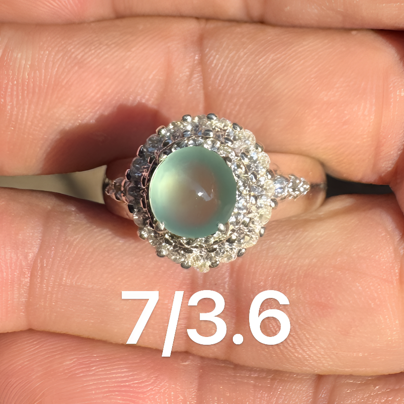 0208(小哪吒在源头)高冰种翡翠高冰晴正圆戒面干净饱满荧光足M60