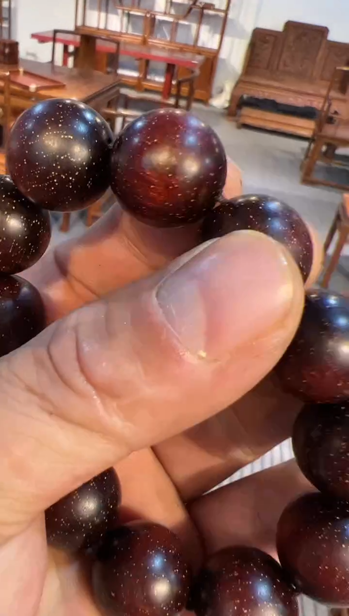 花梨木类木雕款手串一个