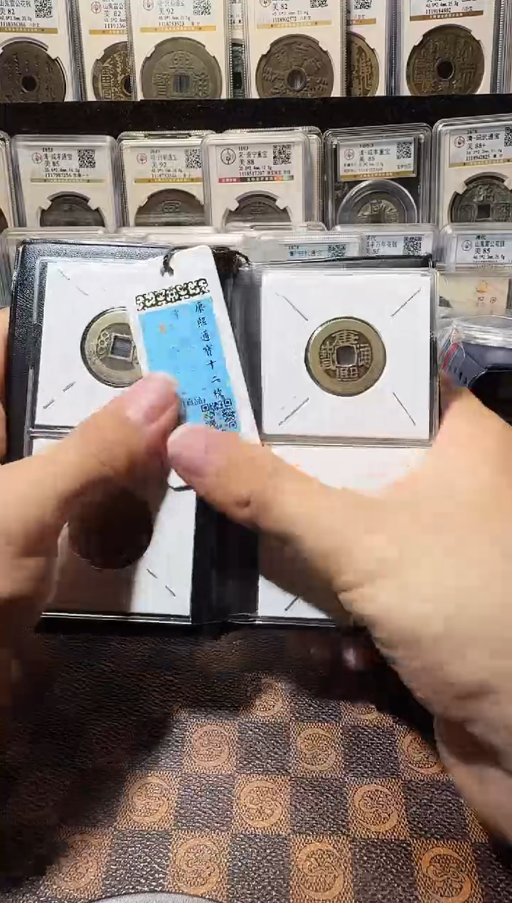 铜A668星龍闻德康熙七分钱十二枚册