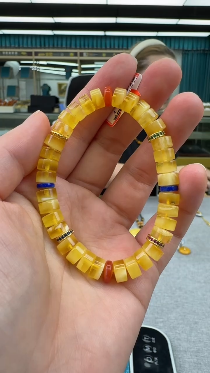 未镶嵌琥珀手链13秒拍号 假一罚三