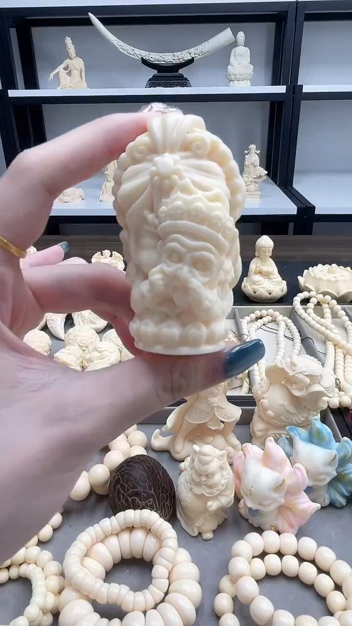 象牙果扎吉拉姆手把件