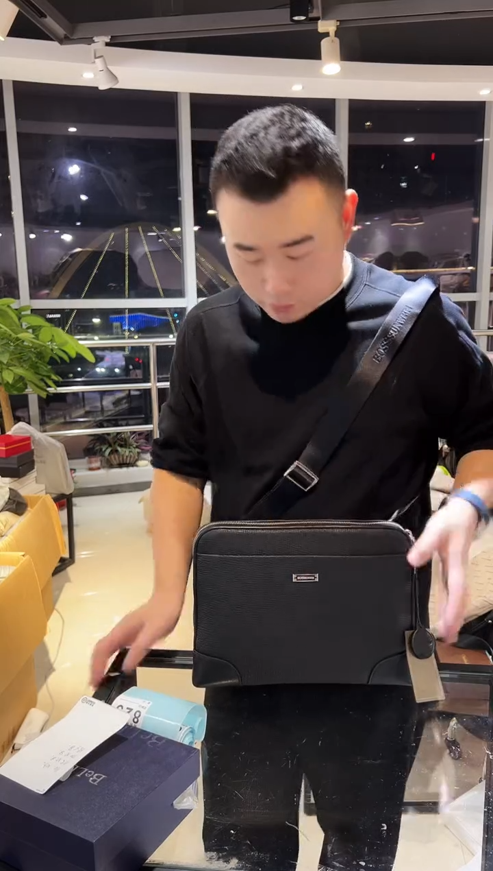 头层牛皮韩爵绅士包包皮具825