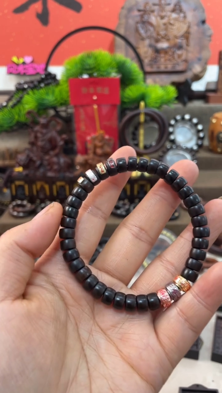 木四***哥枣木玉化三财四喜直切手串