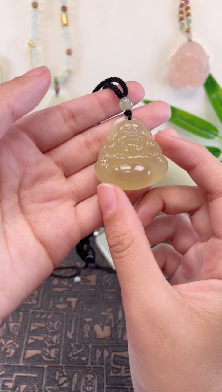 吊坠(赠链)未镶嵌石英质玉天然晴水大肚弥勒佛吊坠（手工绳冰透35