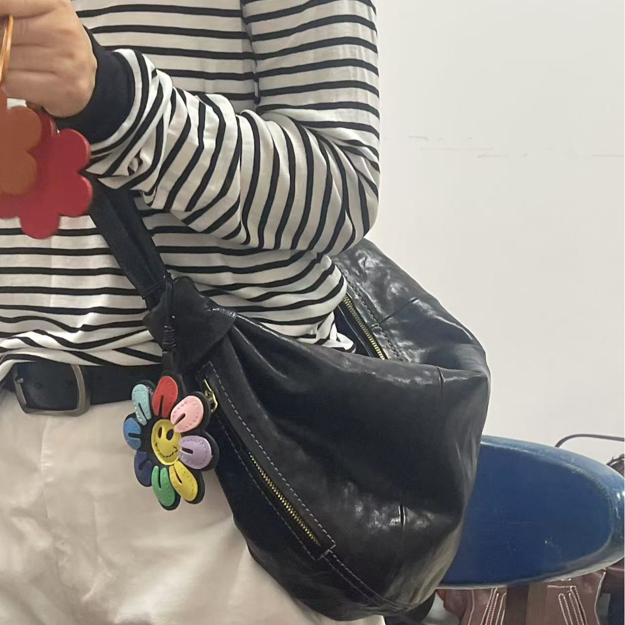 西部印像2025马皮女爆款斜挎时尚INS黑色慵懒百搭牛角包250505