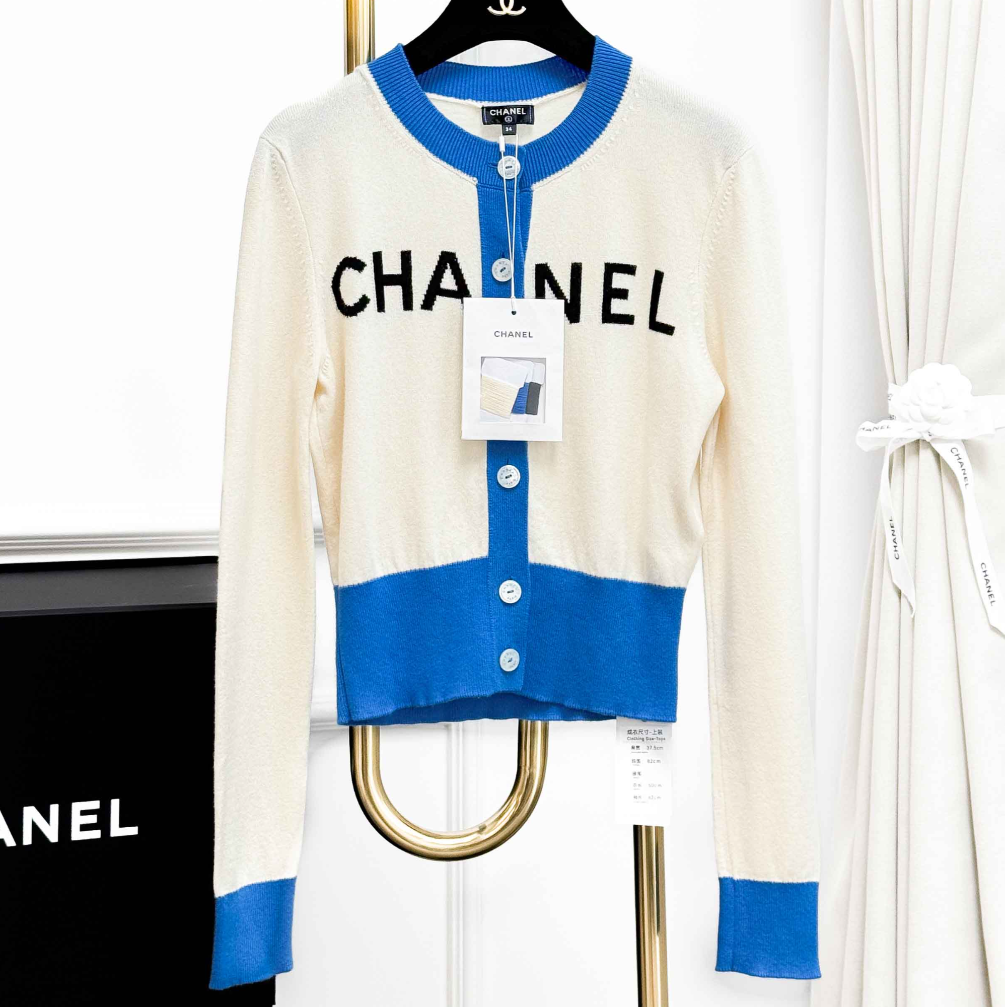 99新 Chanel/香奈儿 34码沙滩系列米白拼蓝色边字母logo长袖开衫