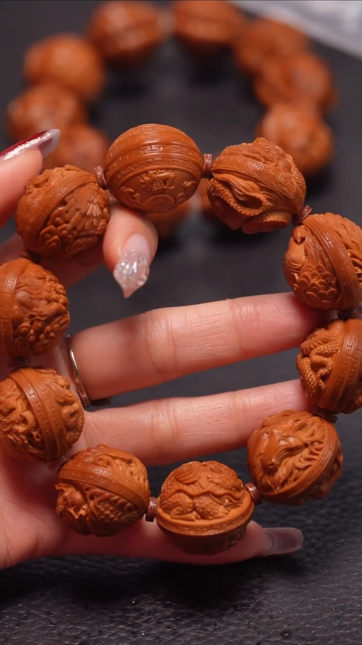 手串橄榄核2.5/双面正圆浮雕瑞兽