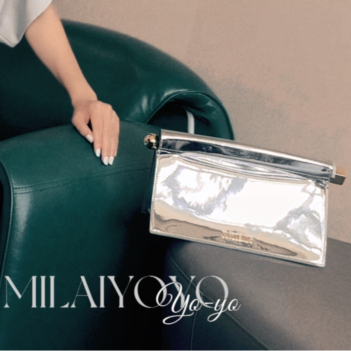 芈莱尤优-新款银色亮面女士手拿包