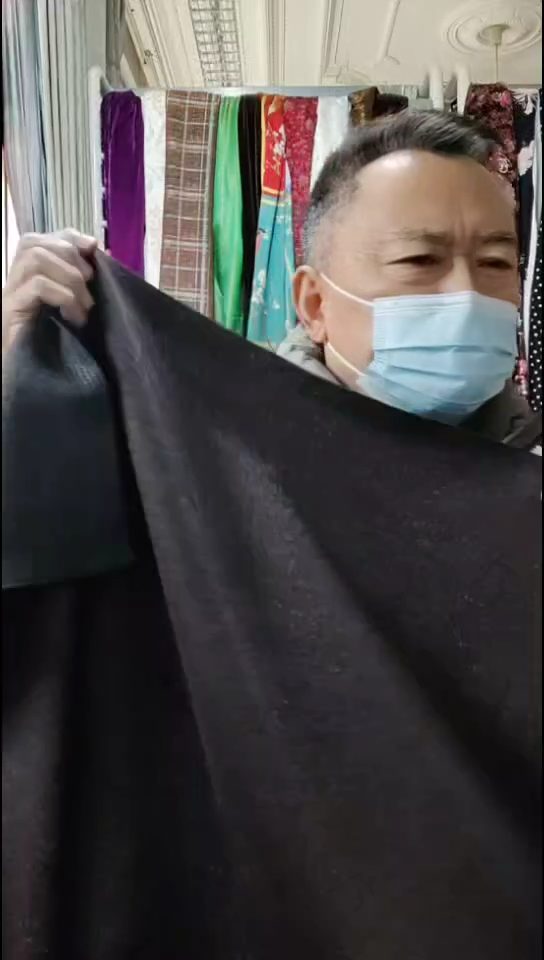 深紫咖雪花针织布料