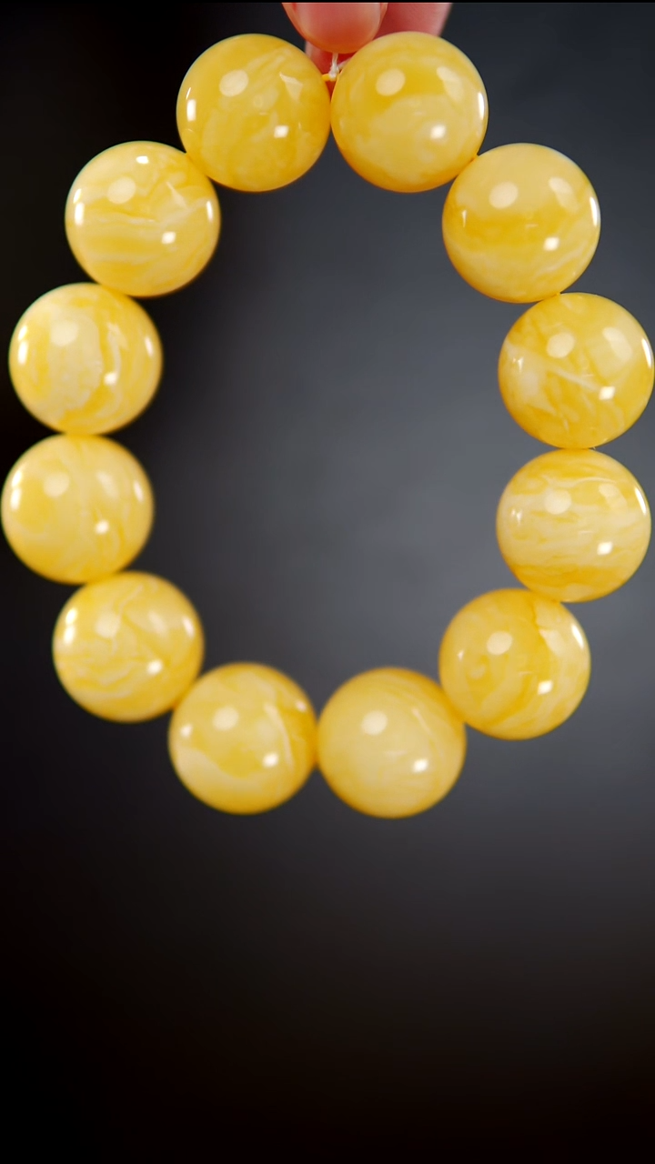 手链琥珀未镶嵌55.86同料焦皮料圆珠手串