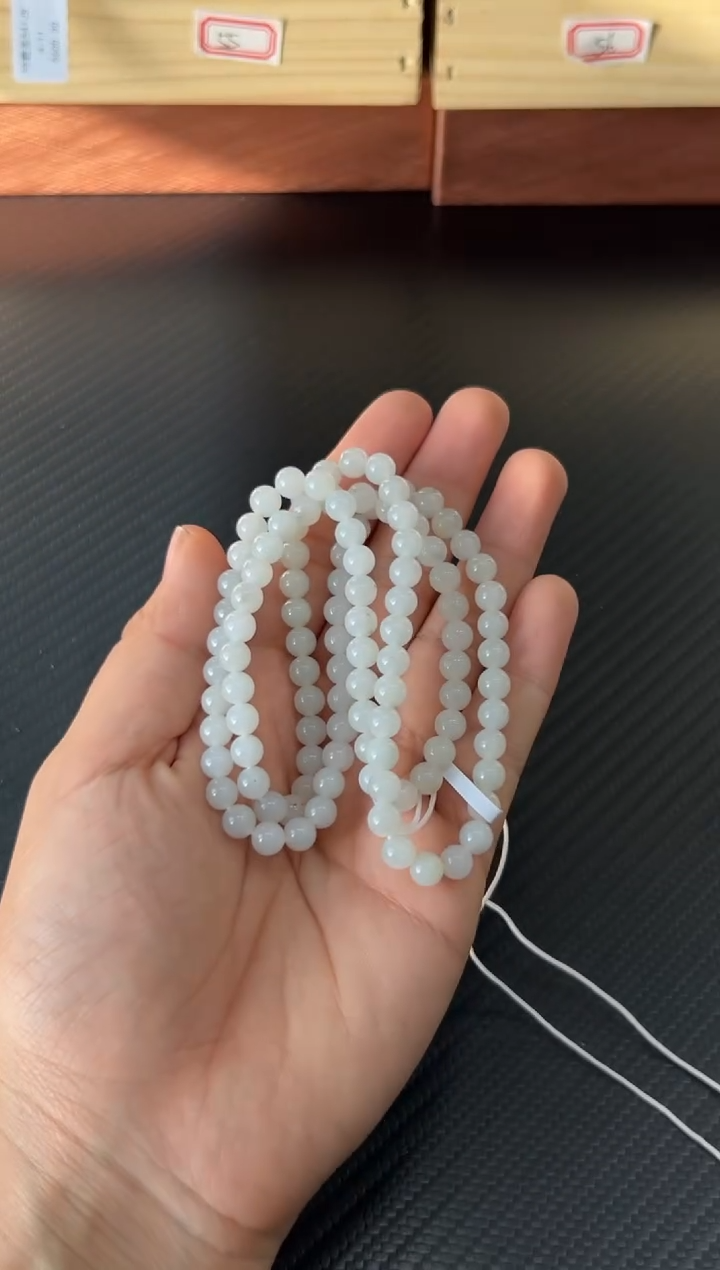 未镶嵌手串和田玉玖****?米达微色差卡6