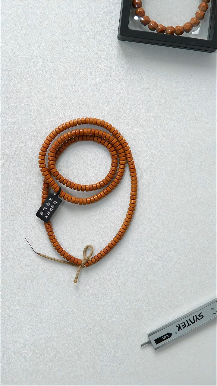 手串橄榄核特价  6.0mm 老挝核尖药片108
