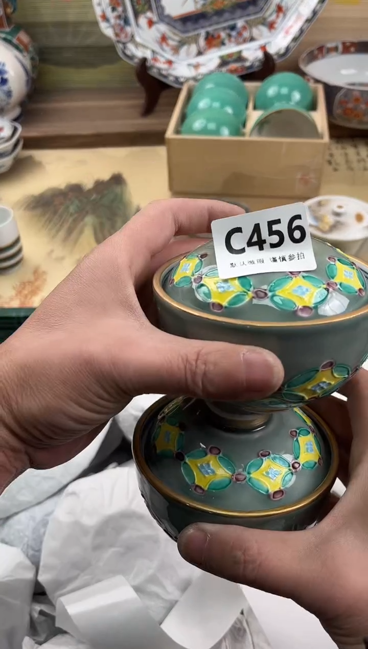 瓷片心*哥456            