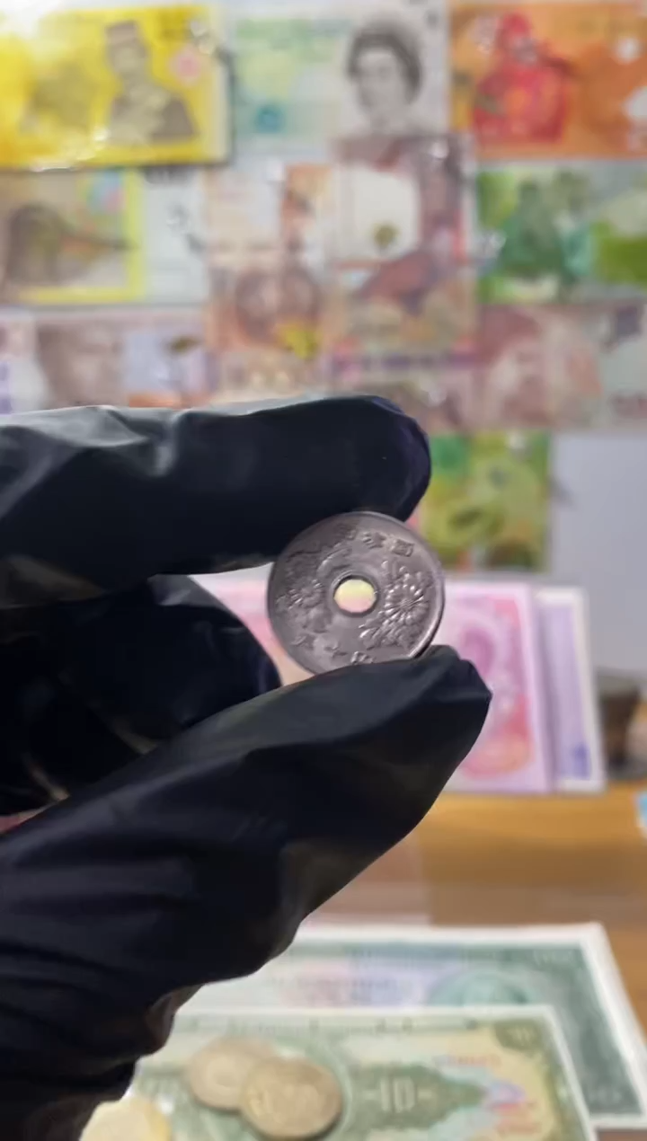 普通金属币小*坨日本50硬币一个