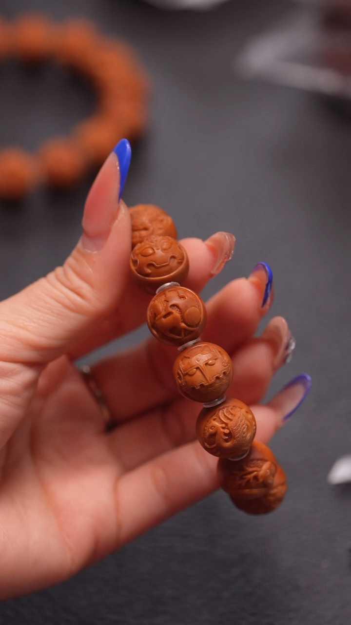 手串橄榄核1.5正圆兽面四象