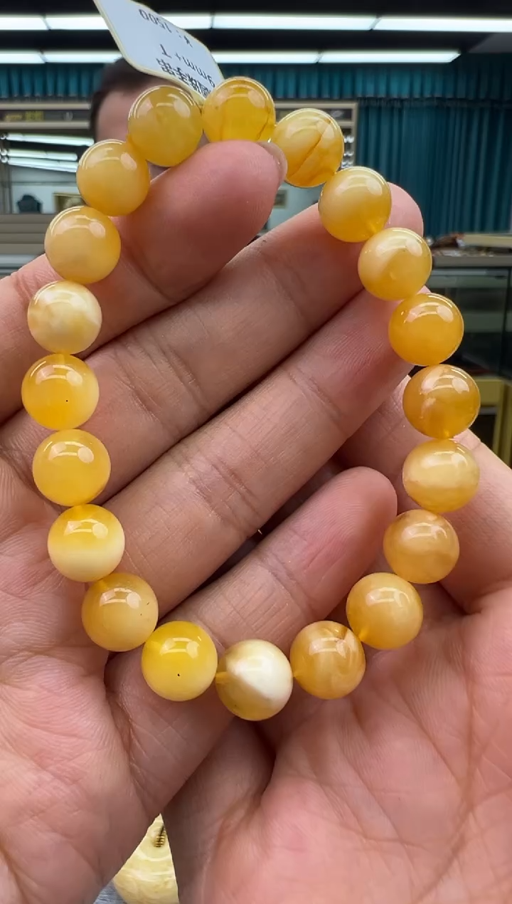未镶嵌琥珀手链51秒拍号 假一罚三
