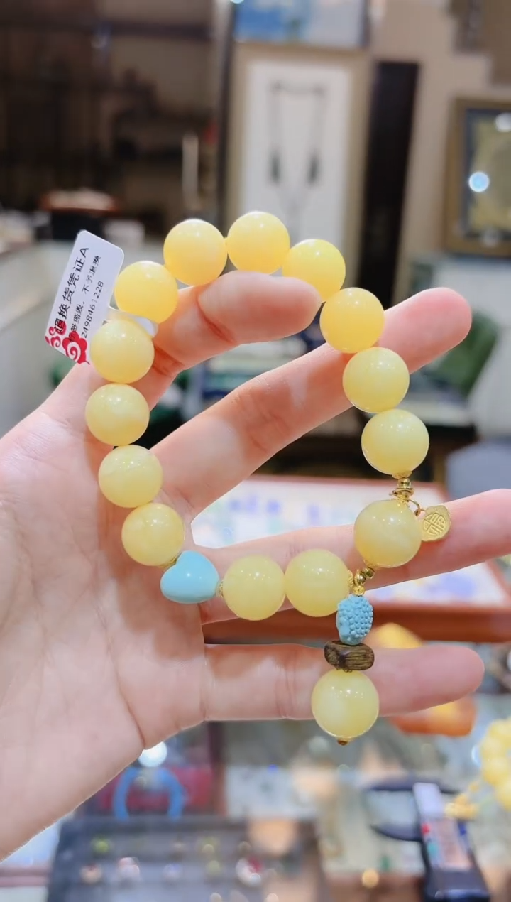 【闪购商品】蜜蜡手串18K金镶嵌绿松无相佛提溜蓝爱心蜜蜡手串