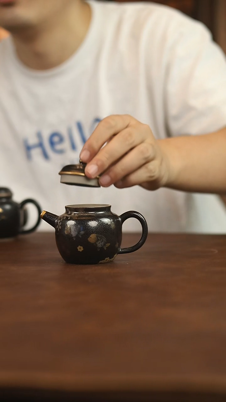 瓷片鱼德钟壶鱼德钟壶