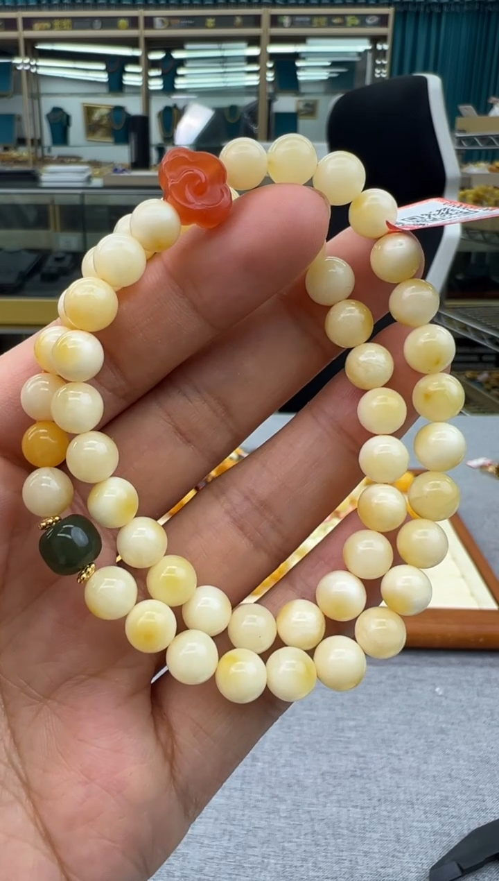 未镶嵌琥珀手链12秒拍号假一罚十