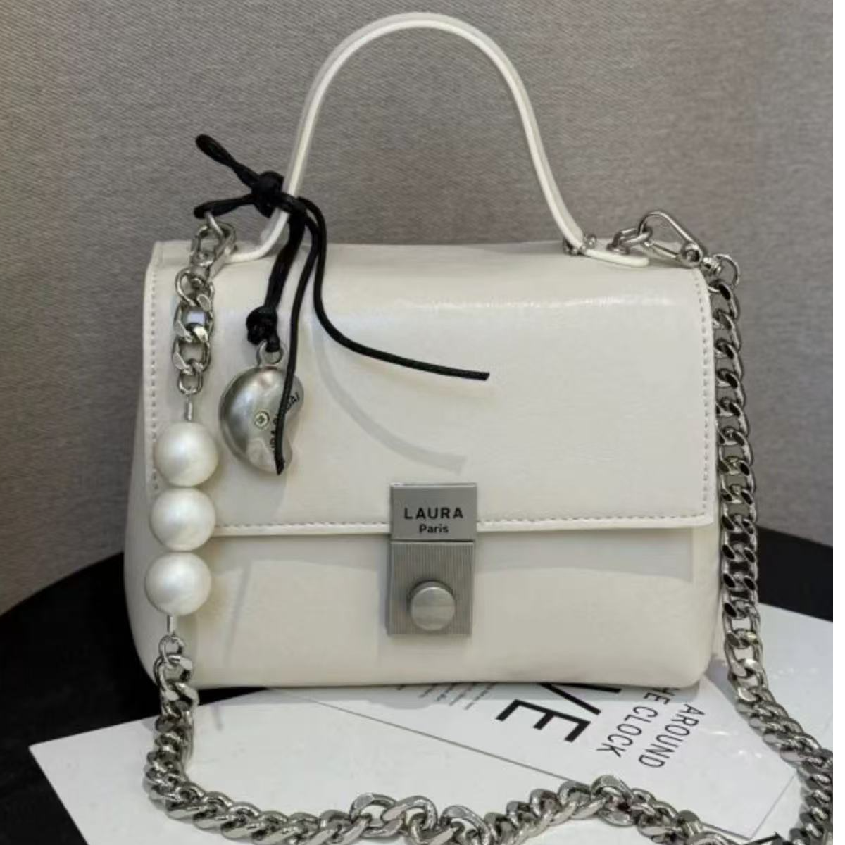 2025新款劳拉时黛精致时尚珍珠链条腋下包油蜡皮小方包女A299